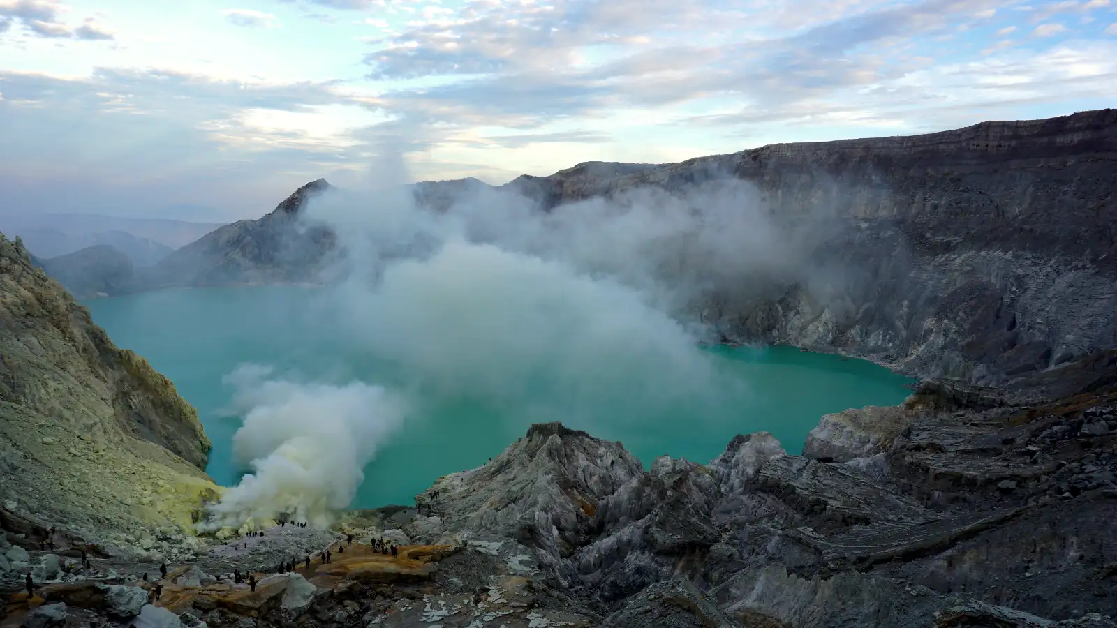 Burning Sulfuric Gas and Liquid Sulfur Close-up of burning sulfuric gas and liquid sulfur at the bottom of Ijen Crater