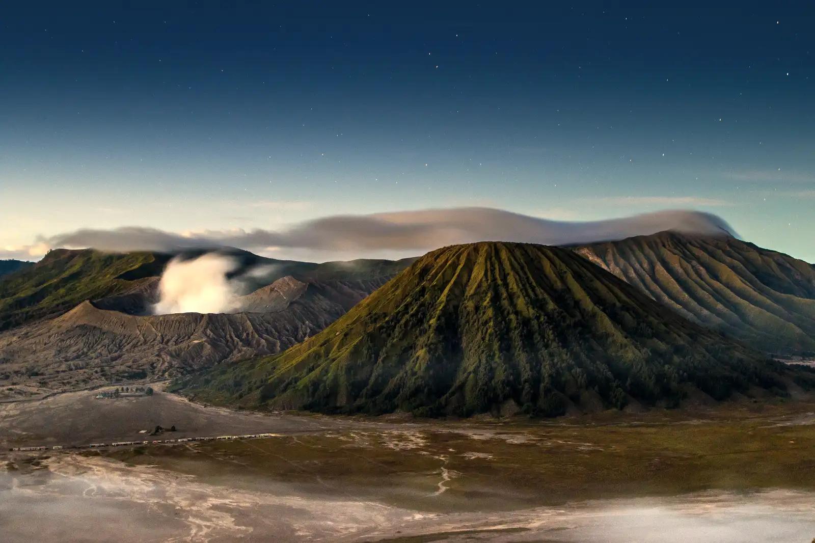 Tourists hiking the steep path at Mount Ijen