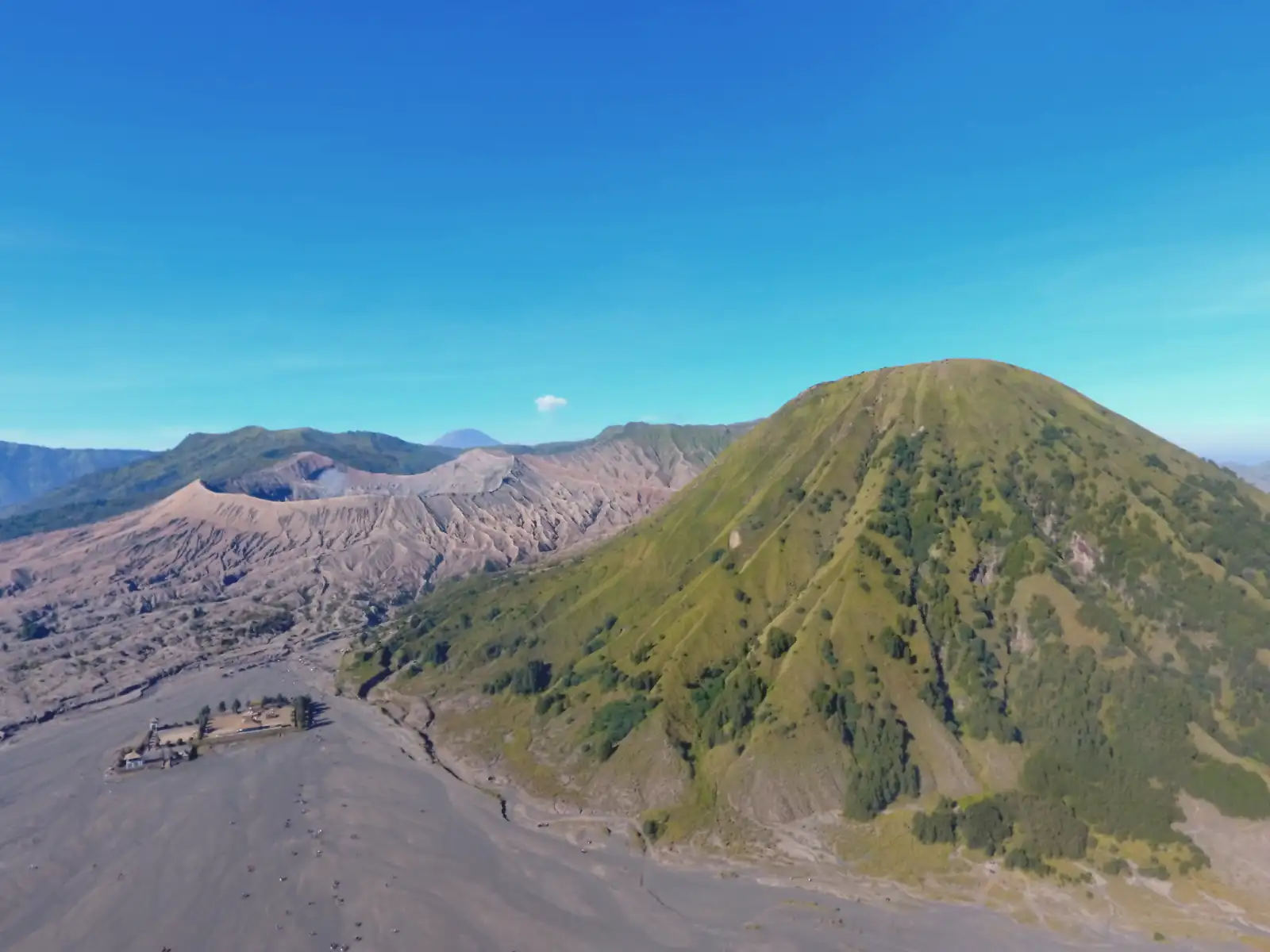 Aerial view of Ijen Crater with surrounding volcanic peaks
