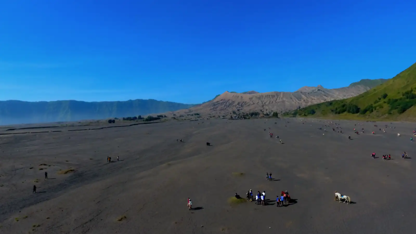 Jeeps crossing the Sea of Sand at Mount Bromo