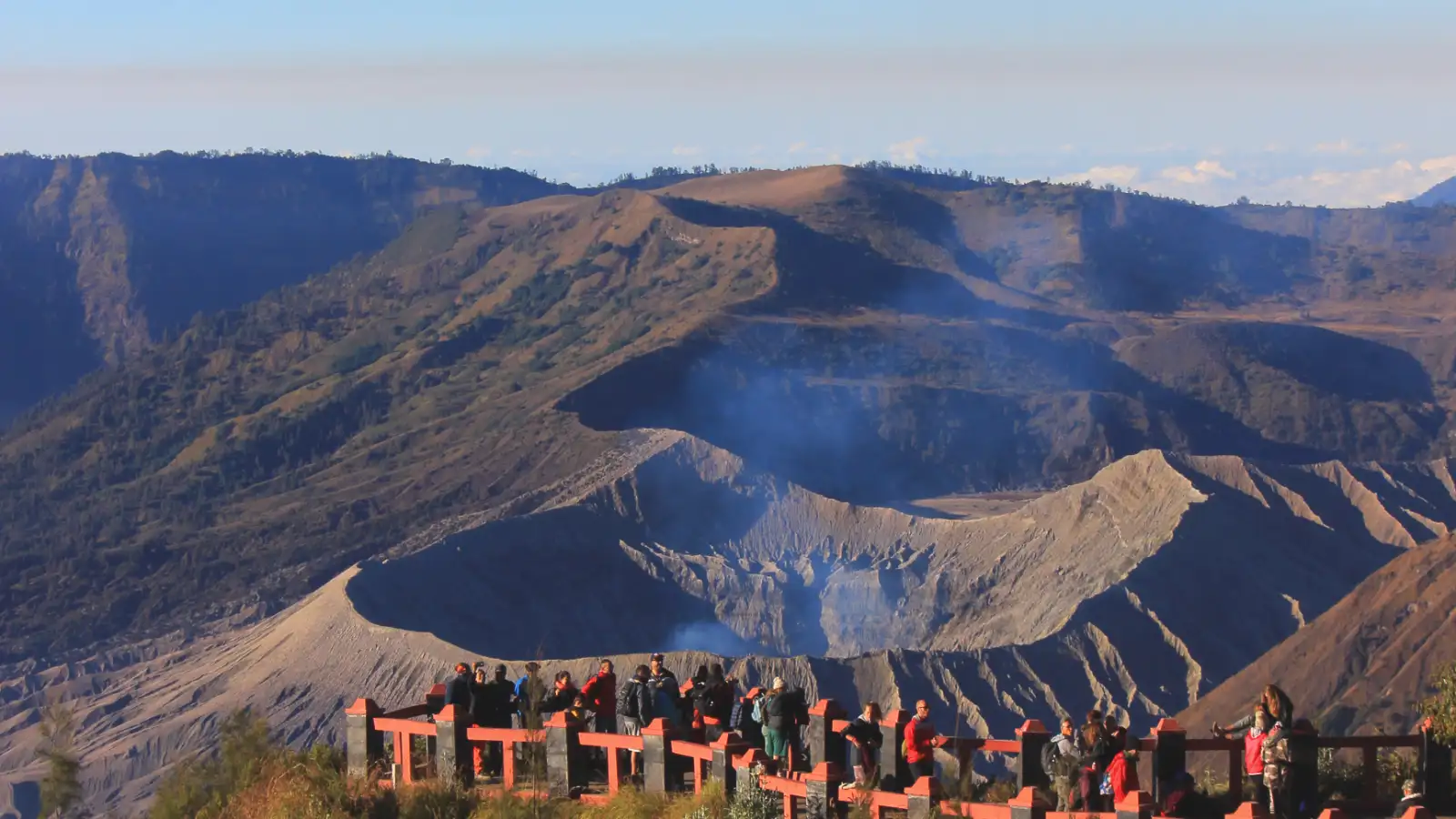Mount Bromo Ijen Expedition Experience Vibrant sunrise over Mount Bromo and Ijen Crater landscape