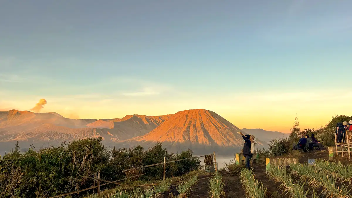 Bromo Ijen Adventure Mount Bromo sunrise view with orange and teal sky